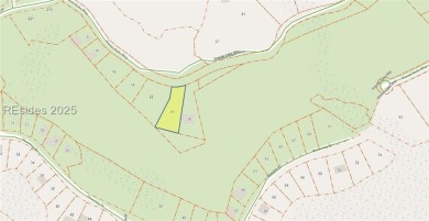 Large wooded lot located in Pleasant Point Plantation situated on The Golf Club at Pleasant Point Plantation in South Carolina - for sale on GolfHomes.com, golf home, golf lot