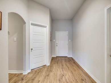 Beautiful one-story Blanco Valley Home tucked back in the gated on Vaaler Creek Golf Club in Texas - for sale on GolfHomes.com, golf home, golf lot