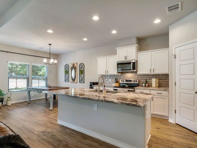 Beautiful one-story Blanco Valley Home tucked back in the gated on Vaaler Creek Golf Club in Texas - for sale on GolfHomes.com, golf home, golf lot