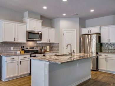 Beautiful one-story Blanco Valley Home tucked back in the gated on Vaaler Creek Golf Club in Texas - for sale on GolfHomes.com, golf home, golf lot