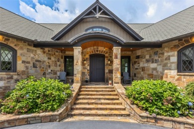 This custom home is noteworthy for its elegant stone facade on Cullasaja Club in North Carolina - for sale on GolfHomes.com, golf home, golf lot