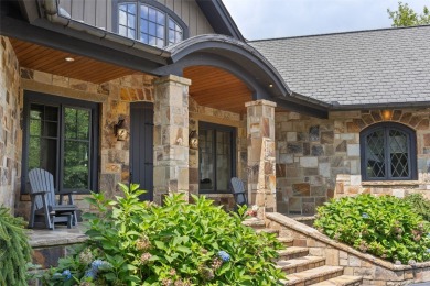 This custom home is noteworthy for its elegant stone facade on Cullasaja Club in North Carolina - for sale on GolfHomes.com, golf home, golf lot