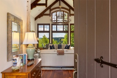 This custom home is noteworthy for its elegant stone facade on Cullasaja Club in North Carolina - for sale on GolfHomes.com, golf home, golf lot