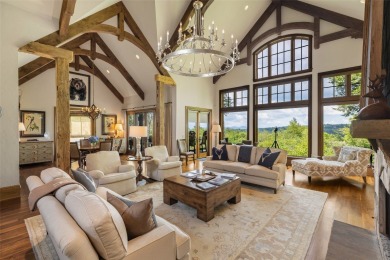 This custom home is noteworthy for its elegant stone facade on Cullasaja Club in North Carolina - for sale on GolfHomes.com, golf home, golf lot