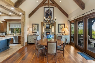 This custom home is noteworthy for its elegant stone facade on Cullasaja Club in North Carolina - for sale on GolfHomes.com, golf home, golf lot