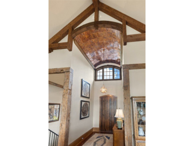 This custom home is noteworthy for its elegant stone facade on Cullasaja Club in North Carolina - for sale on GolfHomes.com, golf home, golf lot