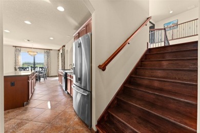Welcome to this WATERFRONT GEM with 6 bedrooms and 4 full on Oaks National Golf Course in Florida - for sale on GolfHomes.com, golf home, golf lot