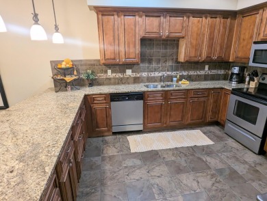 UPSCALE & EXCEPTIONAL is this 2BR/2BA  Walk-In Condo with all on Payne Stewart Golf Club of Branson Hills - Front in Missouri - for sale on GolfHomes.com, golf home, golf lot