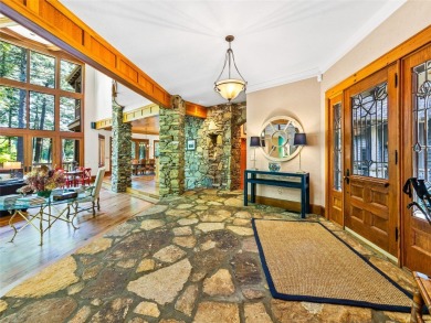 This impressive home boasts a distinctive yet captivating on Lake Toxaway Country Club in North Carolina - for sale on GolfHomes.com, golf home, golf lot