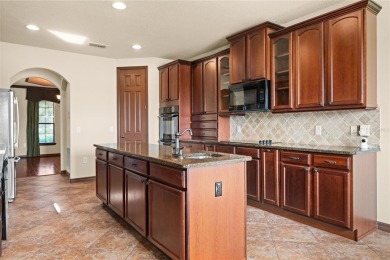 Welcome to this WATERFRONT GEM with 6 bedrooms and 4 full on Oaks National Golf Course in Florida - for sale on GolfHomes.com, golf home, golf lot