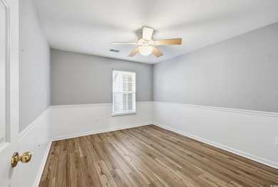 First floor True Blue Condo with screened porch. This unit has on True Blue Plantation in South Carolina - for sale on GolfHomes.com, golf home, golf lot