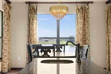 Welcome to this WATERFRONT GEM with 6 bedrooms and 4 full on Oaks National Golf Course in Florida - for sale on GolfHomes.com, golf home, golf lot