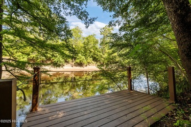 Custom-Built riverfront retreat in the prestigious River on River Landing Golf Course in North Carolina - for sale on GolfHomes.com, golf home, golf lot