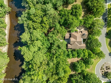 Custom-Built riverfront retreat in the prestigious River on River Landing Golf Course in North Carolina - for sale on GolfHomes.com, golf home, golf lot