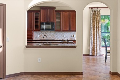 Welcome to this WATERFRONT GEM with 6 bedrooms and 4 full on Oaks National Golf Course in Florida - for sale on GolfHomes.com, golf home, golf lot