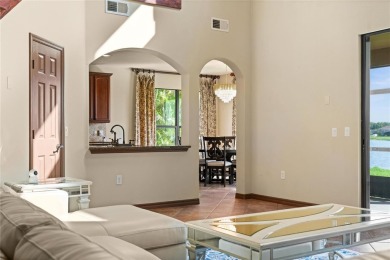Welcome to this WATERFRONT GEM with 6 bedrooms and 4 full on Oaks National Golf Course in Florida - for sale on GolfHomes.com, golf home, golf lot