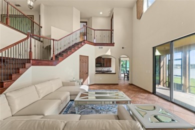 Welcome to this WATERFRONT GEM with 6 bedrooms and 4 full on Oaks National Golf Course in Florida - for sale on GolfHomes.com, golf home, golf lot