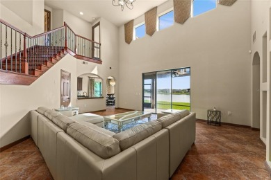 Welcome to this WATERFRONT GEM with 6 bedrooms and 4 full on Oaks National Golf Course in Florida - for sale on GolfHomes.com, golf home, golf lot