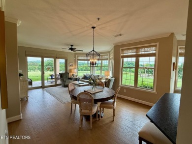 Discover one of the most desirable condos in Rarity Bay on Rarity Bay Country Club - Loudon in Tennessee - for sale on GolfHomes.com, golf home, golf lot