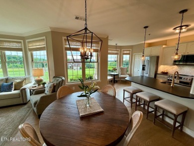 Discover one of the most desirable condos in Rarity Bay on Rarity Bay Country Club - Loudon in Tennessee - for sale on GolfHomes.com, golf home, golf lot