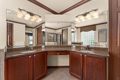 Welcome to this WATERFRONT GEM with 6 bedrooms and 4 full on Oaks National Golf Course in Florida - for sale on GolfHomes.com, golf home, golf lot