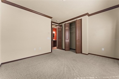 Welcome to this WATERFRONT GEM with 6 bedrooms and 4 full on Oaks National Golf Course in Florida - for sale on GolfHomes.com, golf home, golf lot