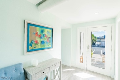 Elegantly updated, open concept living/great room with modern on Terraverde Country Club in Florida - for sale on GolfHomes.com, golf home, golf lot