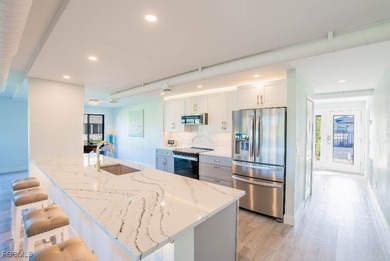 Elegantly updated, open concept living/great room with modern on Terraverde Country Club in Florida - for sale on GolfHomes.com, golf home, golf lot