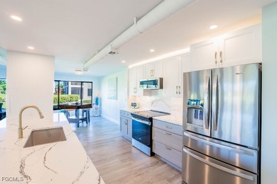 Elegantly updated, open concept living/great room with modern on Terraverde Country Club in Florida - for sale on GolfHomes.com, golf home, golf lot