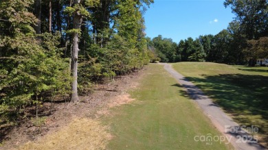 Love to golf and the lake life? This lot has it all! Build your on Marion Lake Club in North Carolina - for sale on GolfHomes.com, golf home, golf lot