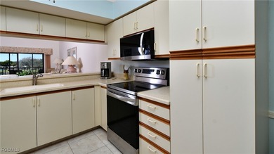 Enjoy sweeping golf and water views from this beautifully on Kelly Greens Golf and Country Club in Florida - for sale on GolfHomes.com, golf home, golf lot