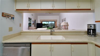 Enjoy sweeping golf and water views from this beautifully on Kelly Greens Golf and Country Club in Florida - for sale on GolfHomes.com, golf home, golf lot