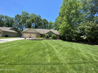 This most desirable split bedroom floor plan is located on on Lake Tansi Village Country Club in Tennessee - for sale on GolfHomes.com, golf home, golf lot