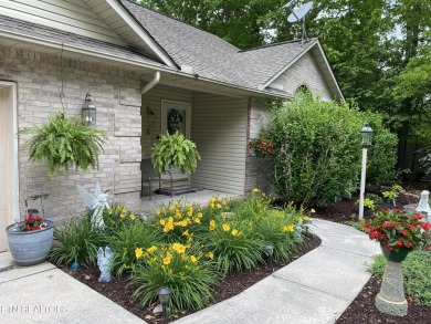 This most desirable split bedroom floor plan is located on on Lake Tansi Village Country Club in Tennessee - for sale on GolfHomes.com, golf home, golf lot