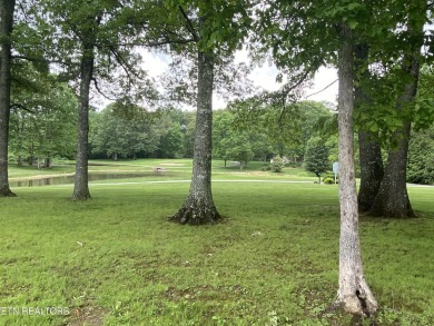 This most desirable split bedroom floor plan is located on on Lake Tansi Village Country Club in Tennessee - for sale on GolfHomes.com, golf home, golf lot