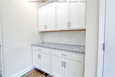 Stunning new construction home with a bright open layout with on Little Creek Country Club in West Virginia - for sale on GolfHomes.com, golf home, golf lot