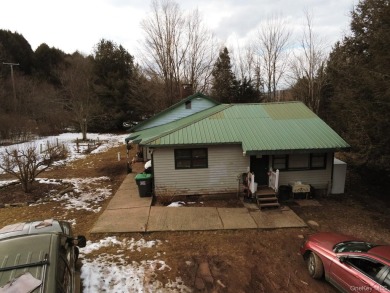 Sold as is.

3 minutes to the ski slopes and across the street on Windham Country Club in New York - for sale on GolfHomes.com, golf home, golf lot