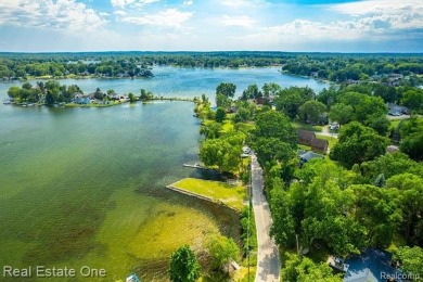 Build Your Dream Home!! On This Beautiful Peninsula Lake Front on Highland Hills Golf Course in Michigan - for sale on GolfHomes.com, golf home, golf lot