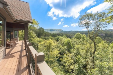 Wake up to the sun-drenched beauty of the Blue Ridge Mountains on Wildcat Cliffs Country Club in North Carolina - for sale on GolfHomes.com, golf home, golf lot