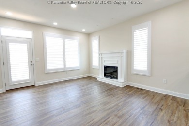 Stunning new construction home with a bright open layout with on Little Creek Country Club in West Virginia - for sale on GolfHomes.com, golf home, golf lot