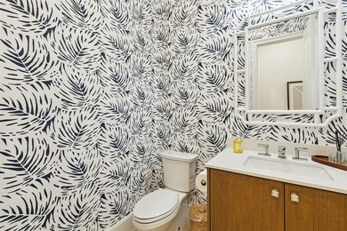 Overlooking the harbor, amphitheater and iconic Hennybay Bridge on Long Cove Golf Course in Texas - for sale on GolfHomes.com, golf home, golf lot