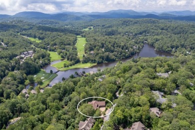 Wake up to the sun-drenched beauty of the Blue Ridge Mountains on Wildcat Cliffs Country Club in North Carolina - for sale on GolfHomes.com, golf home, golf lot