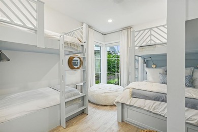 Overlooking the harbor, amphitheater and iconic Hennybay Bridge on Long Cove Golf Course in Texas - for sale on GolfHomes.com, golf home, golf lot