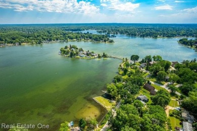 Build Your Dream Home!! On This Beautiful Peninsula Lake Front on Highland Hills Golf Course in Michigan - for sale on GolfHomes.com, golf home, golf lot