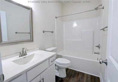 Stunning new construction home with a bright open layout with on Little Creek Country Club in West Virginia - for sale on GolfHomes.com, golf home, golf lot