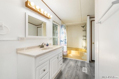 Remodeled manufactured home in lovely waterfront golf course on Tanglewood Shores Golf Club in Virginia - for sale on GolfHomes.com, golf home, golf lot