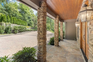 Wake up to the sun-drenched beauty of the Blue Ridge Mountains on Wildcat Cliffs Country Club in North Carolina - for sale on GolfHomes.com, golf home, golf lot