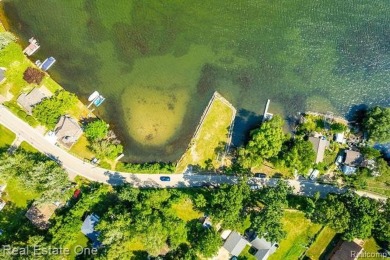 Build Your Dream Home!! On This Beautiful Peninsula Lake Front on Highland Hills Golf Course in Michigan - for sale on GolfHomes.com, golf home, golf lot