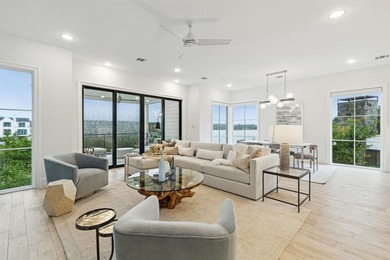 Overlooking the harbor, amphitheater and iconic Hennybay Bridge on Long Cove Golf Course in Texas - for sale on GolfHomes.com, golf home, golf lot