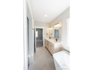 INCLUDES LANDSCAPING & MOVE-IN READY! Welcome to your new home on Sage Lakes Municipal Golf Course in Idaho - for sale on GolfHomes.com, golf home, golf lot